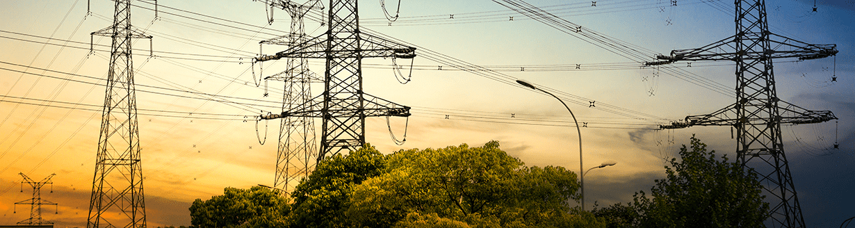 sun-setting-silhouette-electricity-pylons
